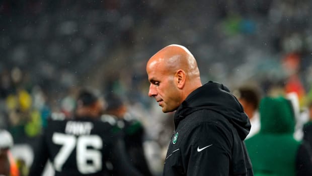New York Jets head coach Robert Saleh walks off field